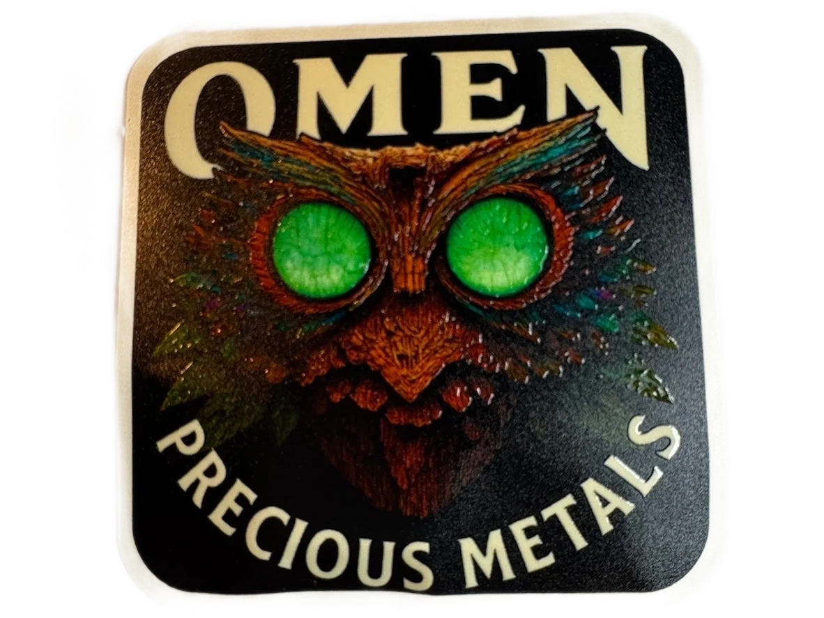 Omen Precious Metals’ sticker with a green-eyed owl